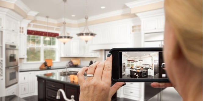 Shopper using AR for eCommerce to see virtual kitchen items in her home-1